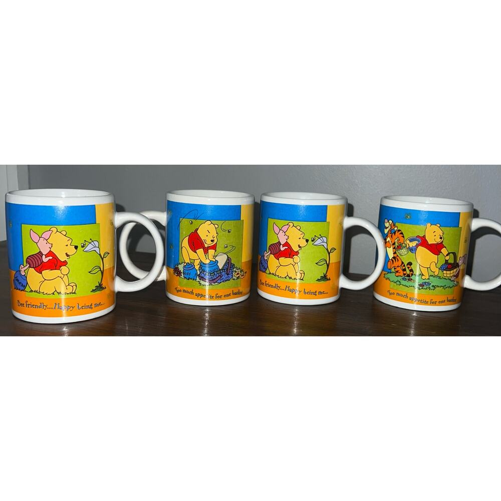 Vintage Disney's Winnie the Pooh,Tigger, and Rue set of 4 coffee mugs. Honey